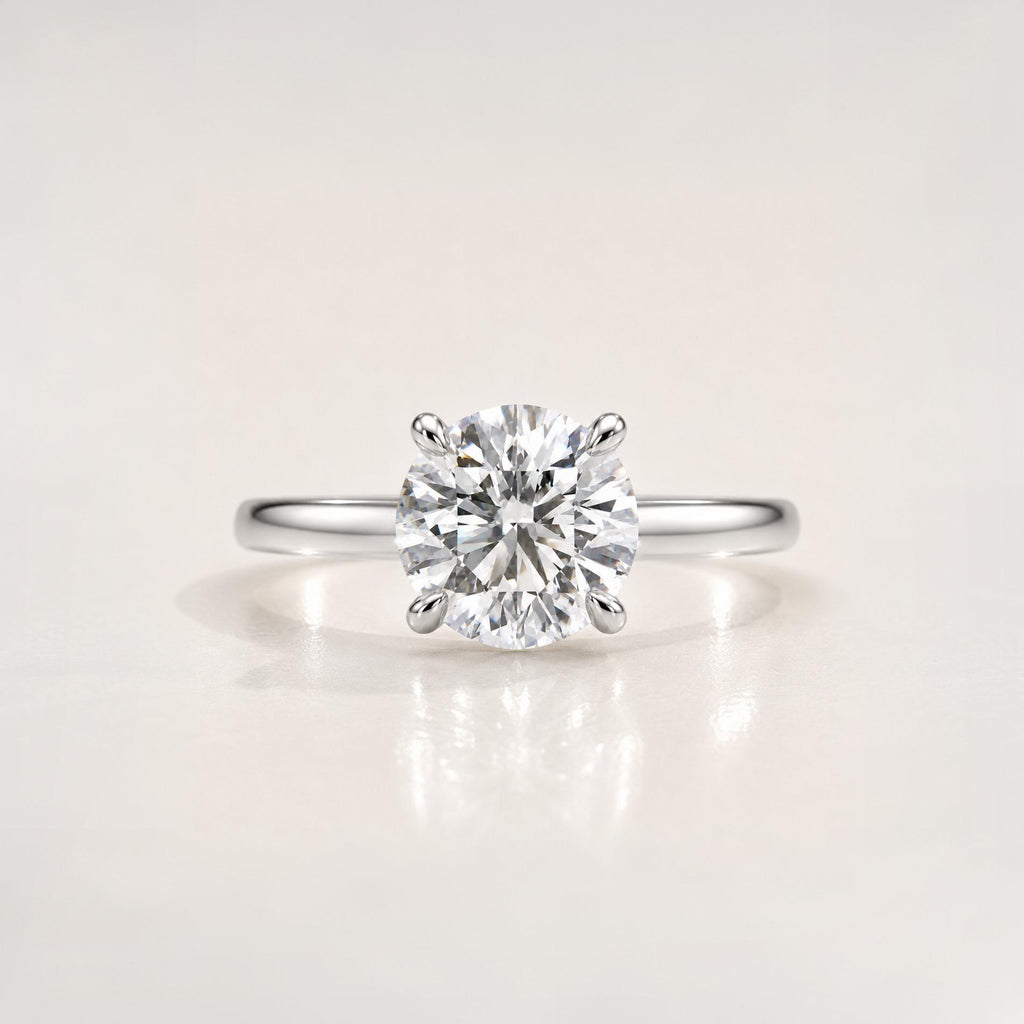 The Round Brilliant Signature Ring