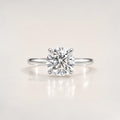 The Round Brilliant Signature Ring