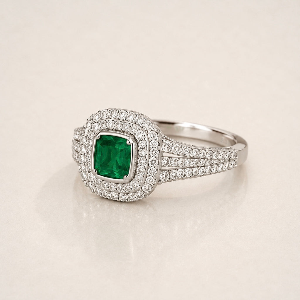 The Triple Halo Pavé Cushion Emerald Ring