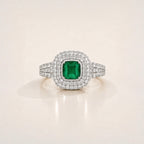 The Triple Halo Pavé Cushion Emerald Ring