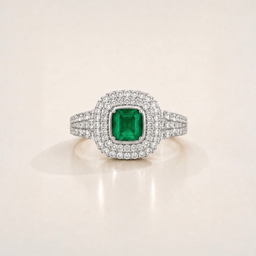 The Triple Halo Pavé Cushion Emerald Ring